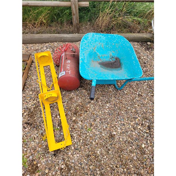 Blue wheel barrel, air tank & a dual fire ext. stand