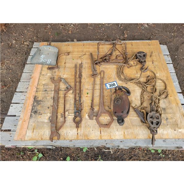 Pallet of antique beaver traps, rope hoist, block & tackle & forging tools