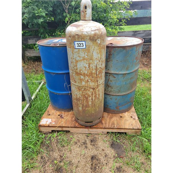 100 lb propane tank & 2- blue drums