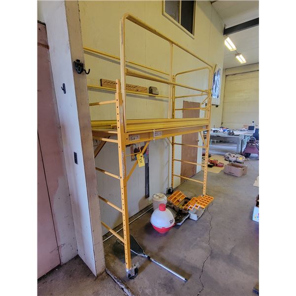 Rolling scaffold, approx. 73 in. x 30 in., height goes up to 12 ft.