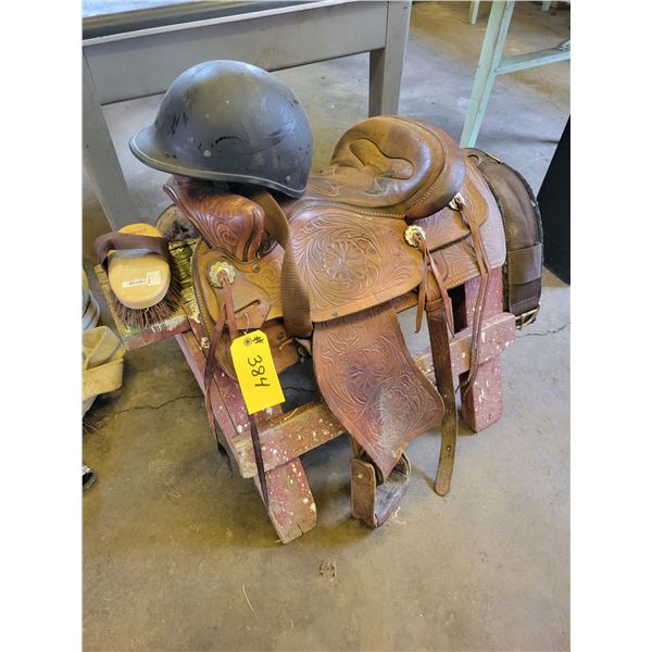 Western rawhide saddle c/w helmet & horse brush