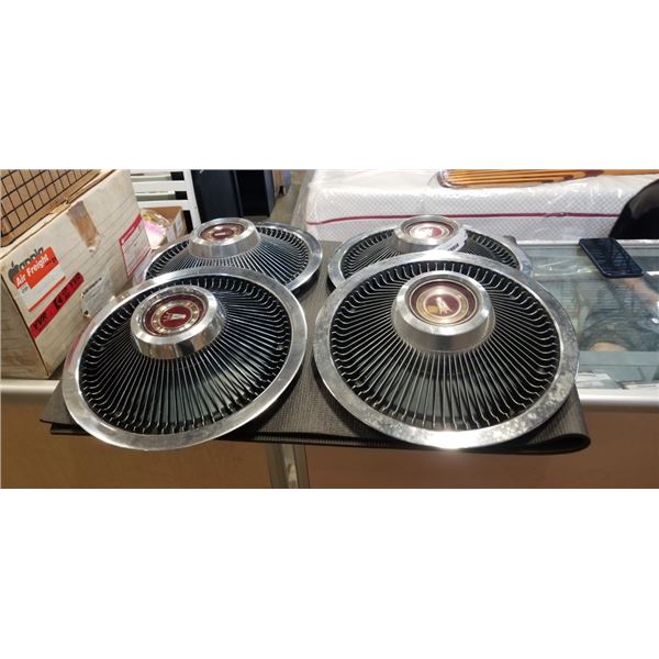 SET OF 4 VINTAGE HUBCAPS