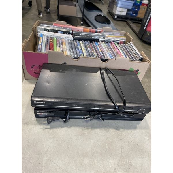 2 DVD PLAYERS AND BOX OF ASSORTED DVD MOVIES