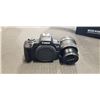 Image 2 : CANON EOS R100 RF-S 18-45MM CAMERA WITH BATTERY AND CHARGER (DOES SAY SET THE LENS TO THE SHOOTING P