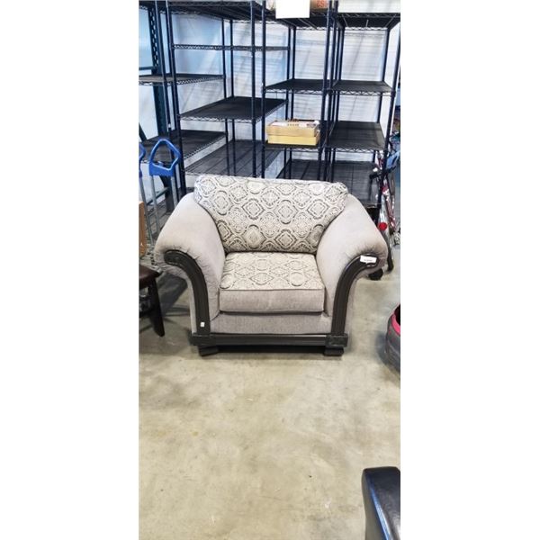 OVERSIZED LIVING CHAIR WITH WOOD ACCENT