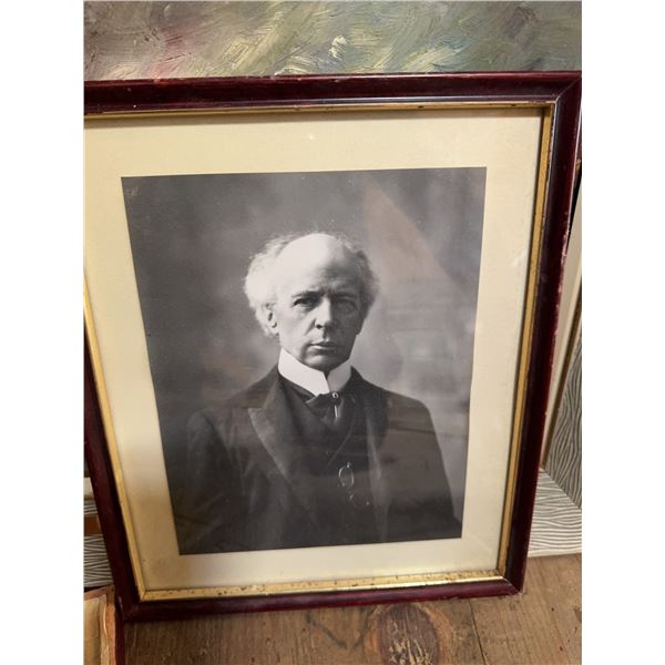 Black and white photo of John A. MacDonald - Canada's first Prime Minister presented in a wooden fra