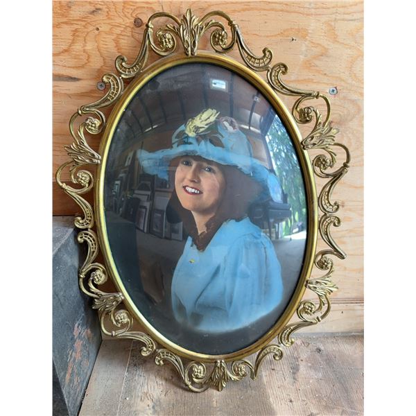 Oval Brass Frame With Portrait Photograph