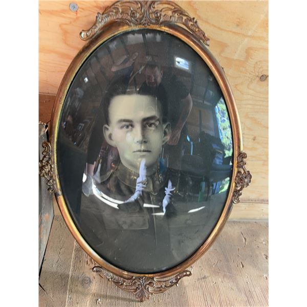Oval Framed Portrait With Ornate Trim