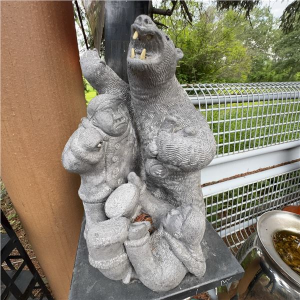 Carved Stone Sculpture of Bear Attacking Two People