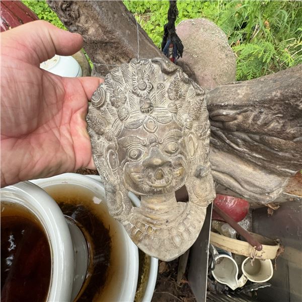 Decorative Ritual Bell With Carved Stone Frame and Mask