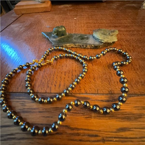 Stone Beaver Carving and Black-Gold Bead Necklace