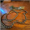 Image 1 : Stone Beaver Carving and Black-Gold Bead Necklace