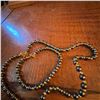 Image 4 : Stone Beaver Carving and Black-Gold Bead Necklace