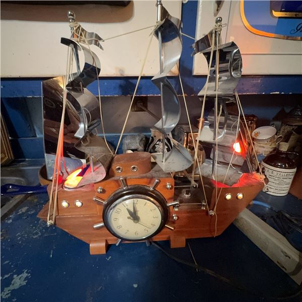 Vintage Ship Shaped Clock with Illuminated Sails and Wheel Face