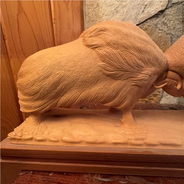 Wood Carving of Two Muskoxen Locking Horns