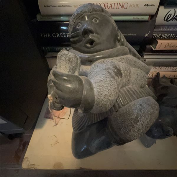 Inuit Soapstone Carving of Kneeling Figure Signed in Syllabics