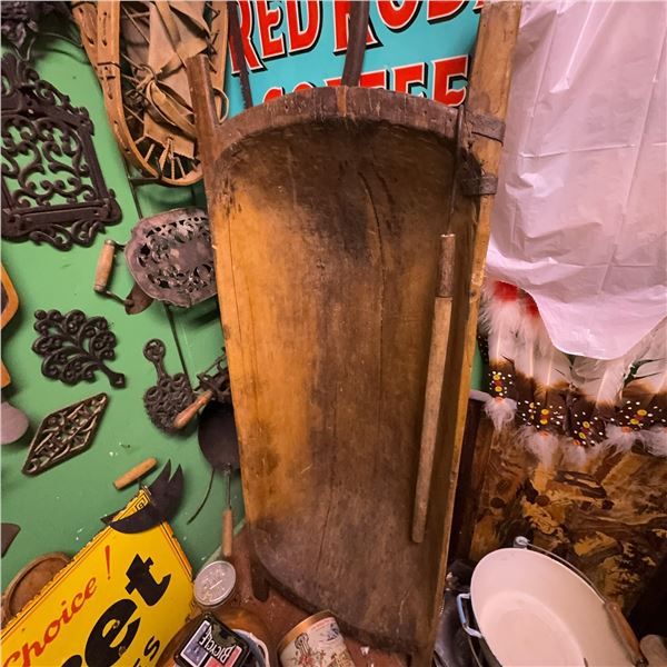 Wooden Trough With Iron Supports and Meat Hook