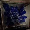 Image 1 : Vintage Blue Glass Bottles in Old Wooden Cabinet