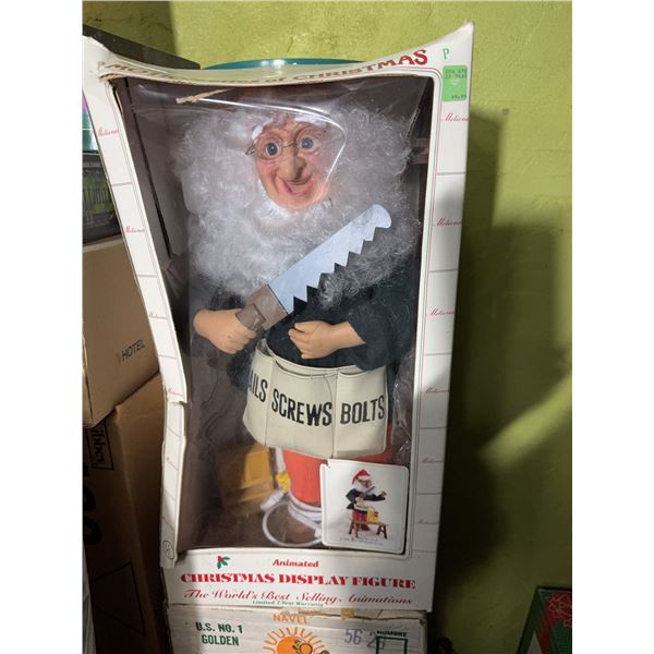 Falco Animated Christmas Display Figure With Saw, 1993, Porcelain