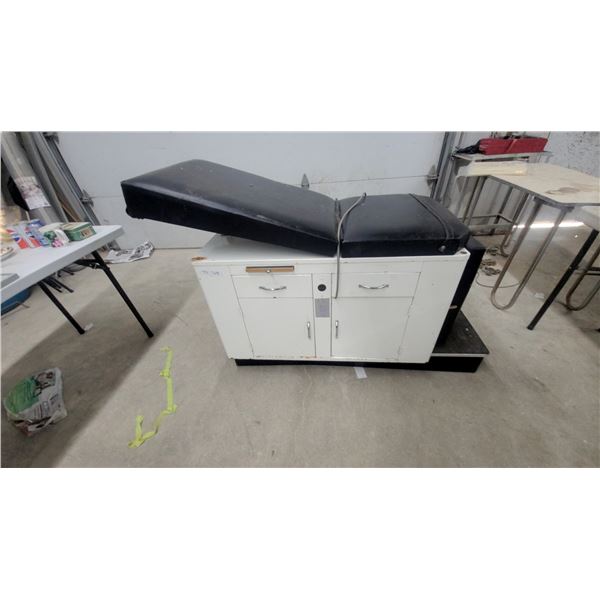 Ritter 75 Medical Examination Table with Black Padded Top, White Cabinets and Pull-Out Footrest