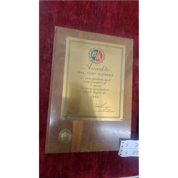 British American Oil Award Plaque to Mrs. Tony Olender and Gulf 25-Year Plaque