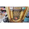 Image 5 : Wurlitzer 1080” Colonial" Jukebox, 1947, with Arched Glass Window and Starburst Speaker Grille
