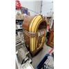 Image 8 : Wurlitzer 1080” Colonial" Jukebox, 1947, with Arched Glass Window and Starburst Speaker Grille