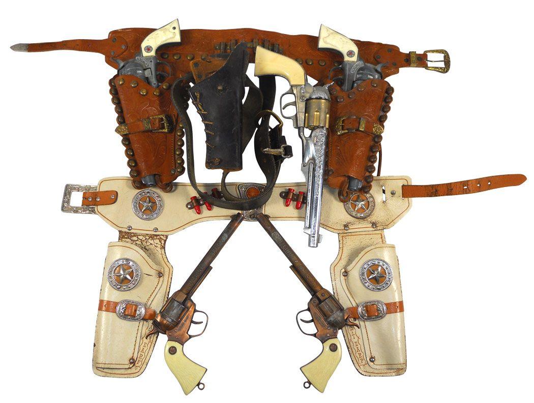 Toy cap guns & holsters (5), 2 Wyatt Earp Buntline Specials w/horse