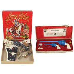 Toy cap guns & holsters in boxes, Lone Rider by Cowboy Ranch Outfit, holster, Nichols Cowhand cap gu