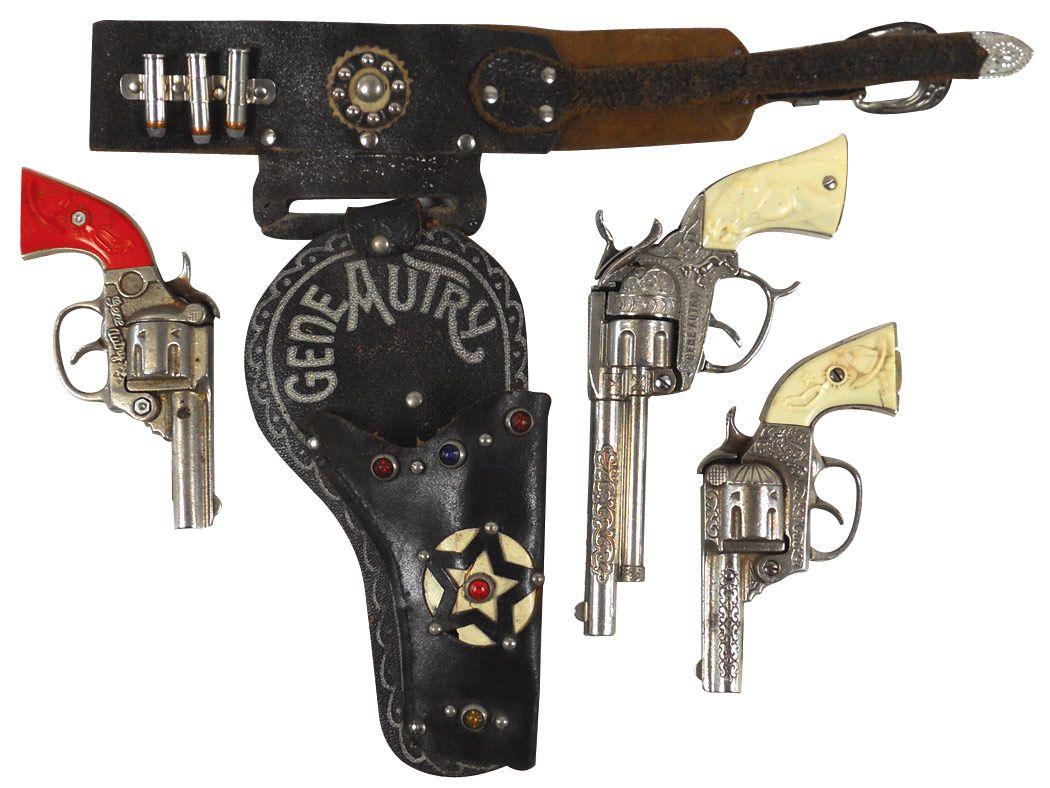 Gene Autry cap guns & holster, 2 small cap guns, 6.5"L, large cap gun