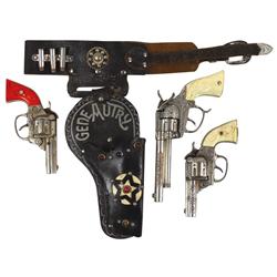 Gene Autry cap guns & holster, 2 small cap guns, 6.5"L, large cap gun, 9"L & single holster, c.1930'