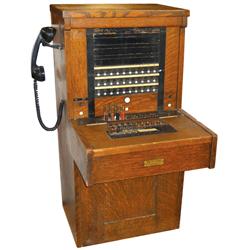 Telephone switchboard, American Electric Co., monotype, orig cond in quartersawn oak cabinet, nice s