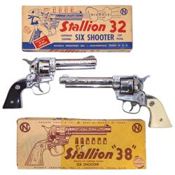 Toy cap guns in boxes, Stallion 38 six-shooter & Stallion 32, both NOS in orig boxes, 10"H x 9"L.