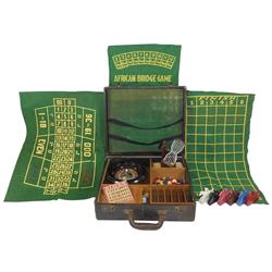 Gambling games, case w/roulette, dice, chuck-a-luck cage, cast metal horses w/riders for Pony Game, 