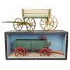 Image 1 : Toy wagons (2), both painted wood w/spoke wheels, one in shadowbox display, both well made, VG cond,