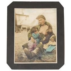 Native American hand-tinted photograph, titled "Michaninies Kow-Kow", copyrighted by F.N. Nowell-a n