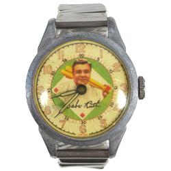 Babe Ruth wrist watch, Swiss made, Babe holding bats on metal face, metal frame shows wear, c.1930's