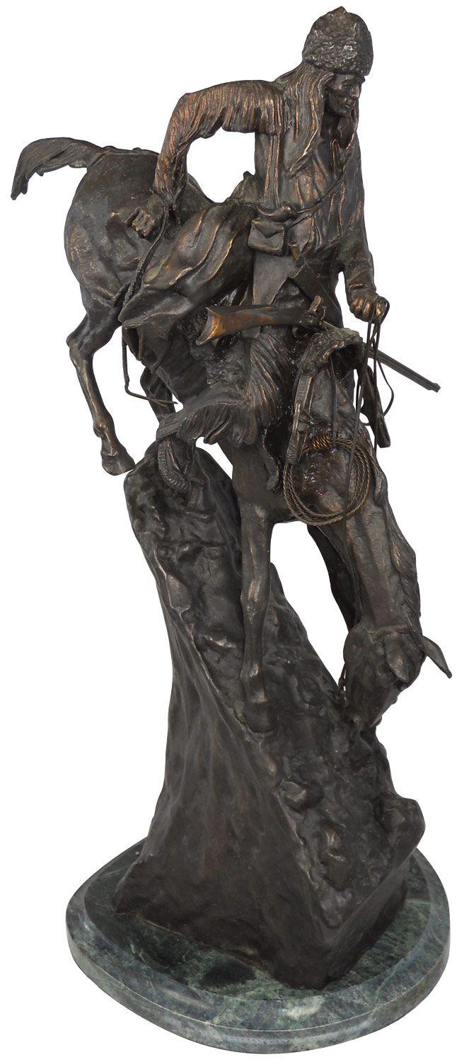 Frederick Remington bronze statue on marble base, titled Mountain Man