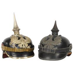 Militaria, 2 wartime Prussian infantry helmets, one inside reads "J.R. 55 B.A. VH 1916, hat badge re