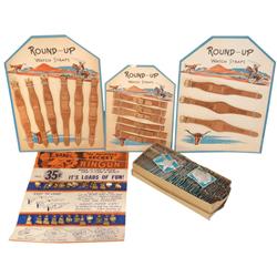 Western novelties, box of special police & deputy sheriff badges, 4 other display cards full of Roun