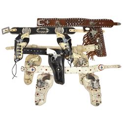 Toy cap guns & holsters (8), 2 Buck'n Bronc double holster sets by Geo. Schmidt, Wild Bill Hickok w/