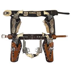 Toy cap guns & holsters, Hubley Texan Jr. & Cowboy cap guns w/double holsters, c.1950's, Good to VG 