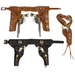 Toy cap guns & holsters, 2 Hubley Texan Jr. cap guns, 2 cowboy, 2 Western by Hubley w/3 double holst