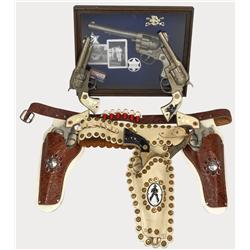 Toy cap guns (6), 4 Hubley Texan Jrs., Cowboy in shadowbox frame, another Cowboy gun & single & doub