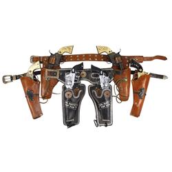 Toy cap guns, 3 pr of TV character cap guns w/holsters, set of Cowboy cap guns in Paladin holster, G