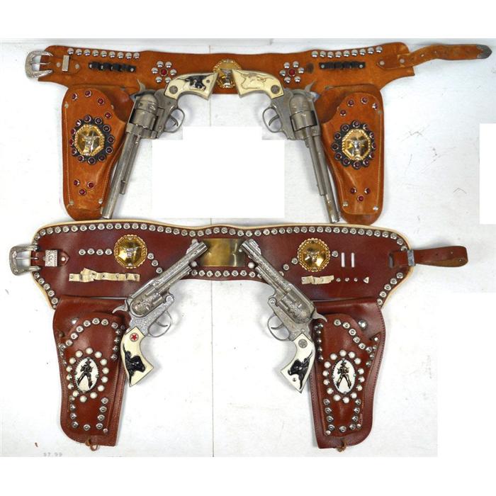Toy cap gun & holster sets, 2 Hubley Texan Jr guns w/fancy double