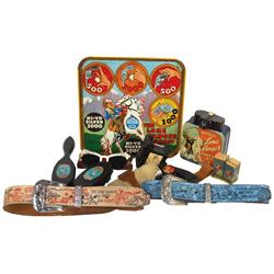 Lone Ranger items, includes metal target, gun in holster, brushes, belts, first aid kit, sunglasses,
