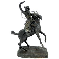 Western bronze statue by C.M. Russell, cowboy on horse, VG cond, 11.5"H x 7.5"L.