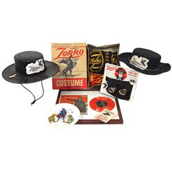 Disney Zorro items (7), costume in box, framed record, hats, scarf mask on card, plate & hang card, 