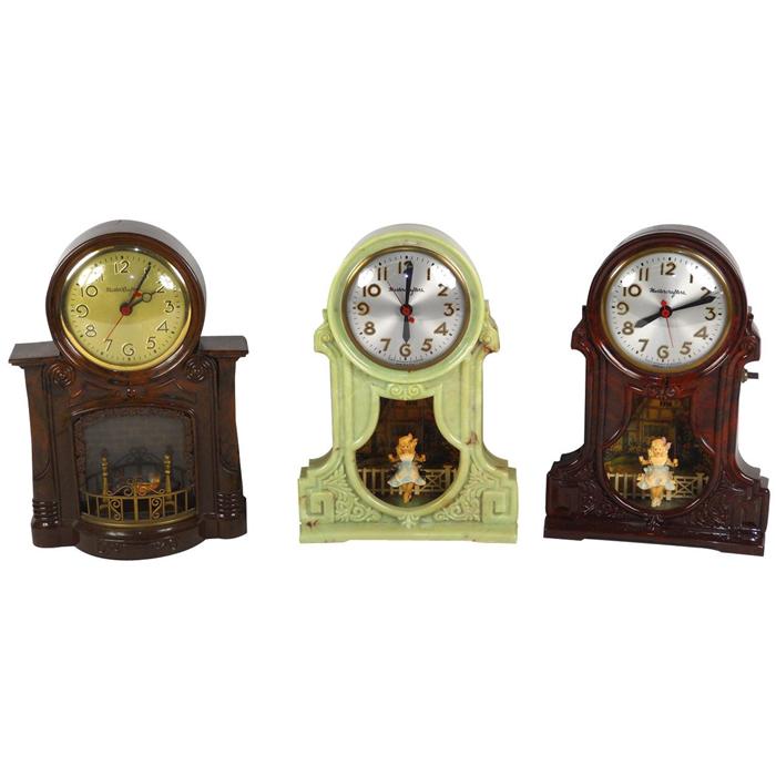Mastercrafters motion clocks (3), 2 different styleschildren on swings